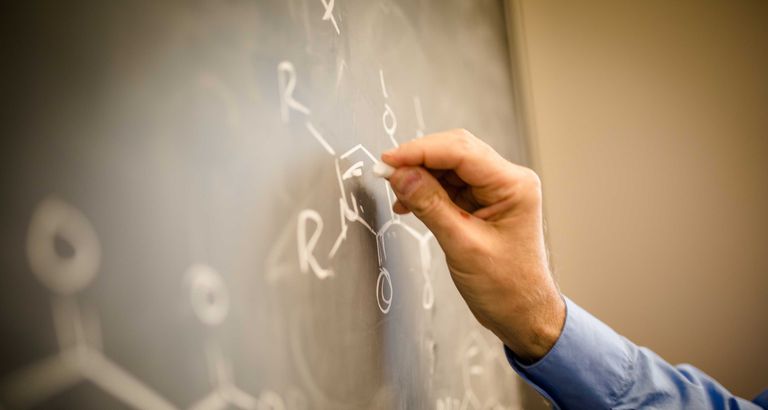 hand-writing-on-chalkboard