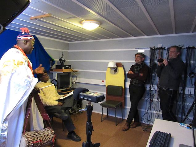 Researchers conducting interview with camera