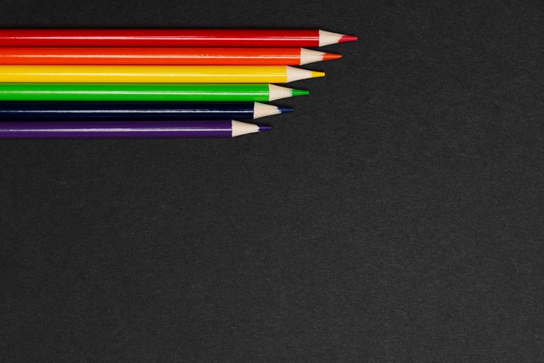 Colored pencils in rainbow order