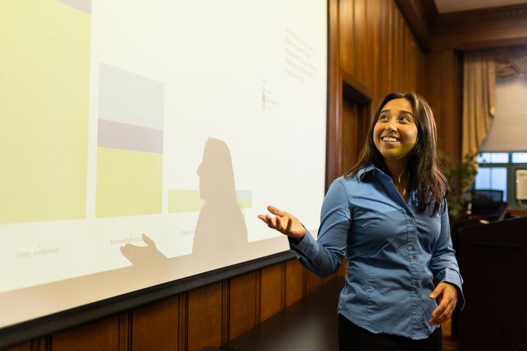 Woman presenting her research