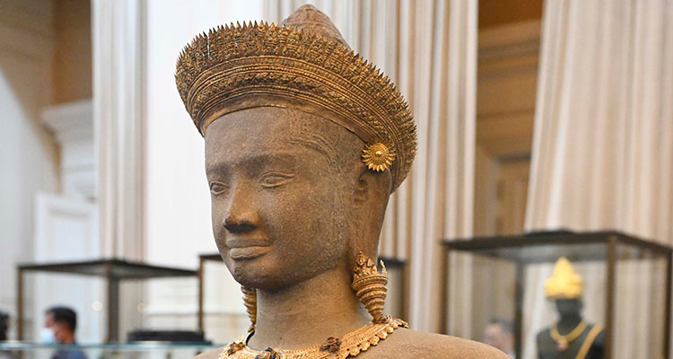 A centuries-old looted sandstone statue, repatriated to Cambodia in 2023.