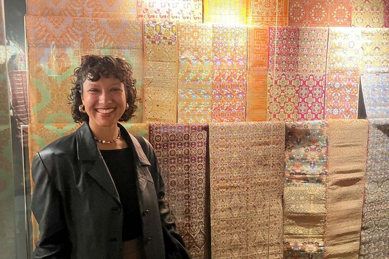 Morgan Snoap, in front of silk belts displayed in the Dar Batha Museum of Islamic Arts in Fes, Morocco