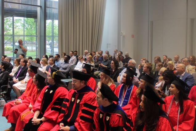 Photo of Graduates and Audience