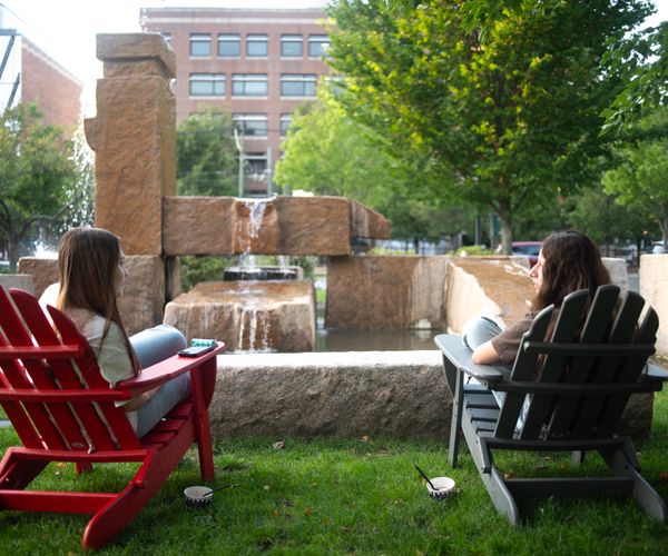 Students outside seated