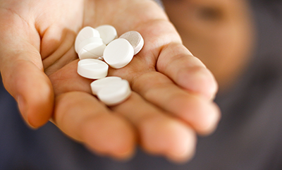 hand-holding-tablets