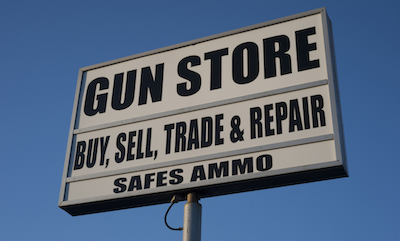 sign of gun store, buy, sell, trade, and repair