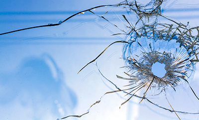 thumbnail-bullet-holes-in-glass