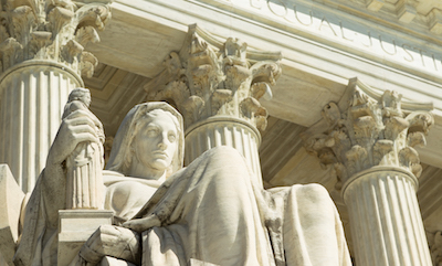 US Supreme Court pillars and statue of justice