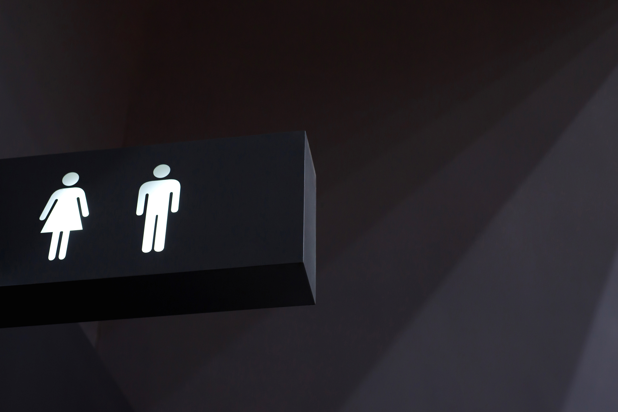 Public restroom signs for men and women