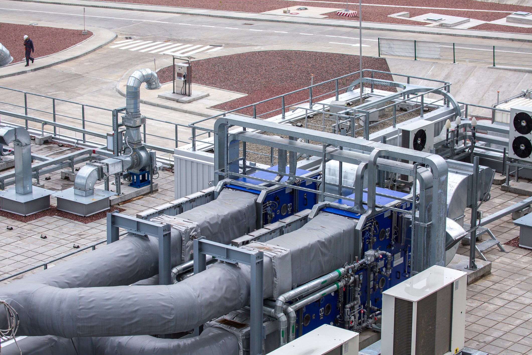 External infrastructure of the microclimate support system at a large industrial site. Air pipelines inlet and exhaust. Fans and air conditioning. Systems of control of pressure, humidity, temperature
