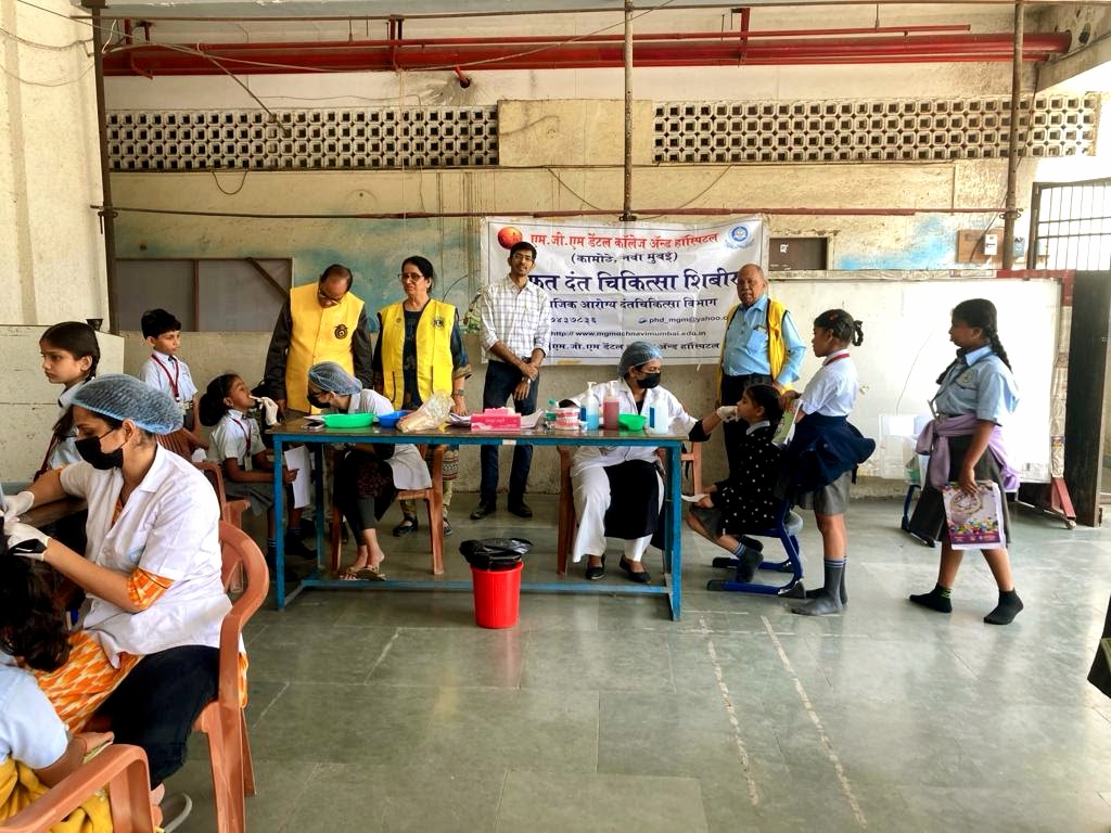 School children line up for dental screening