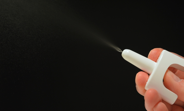NALOXONE nasal spray from the emergency bag, contain medication used in recovery of Opioid drugs overdose. Nasal medications drugs from overdose kit.