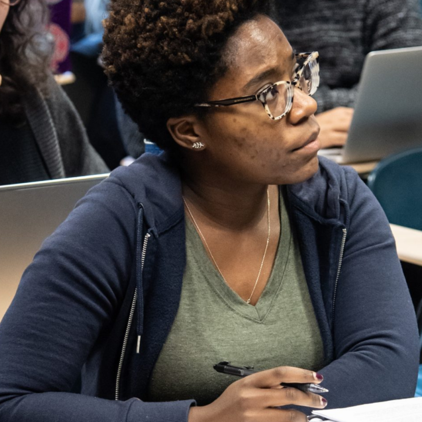  a student listens in class 