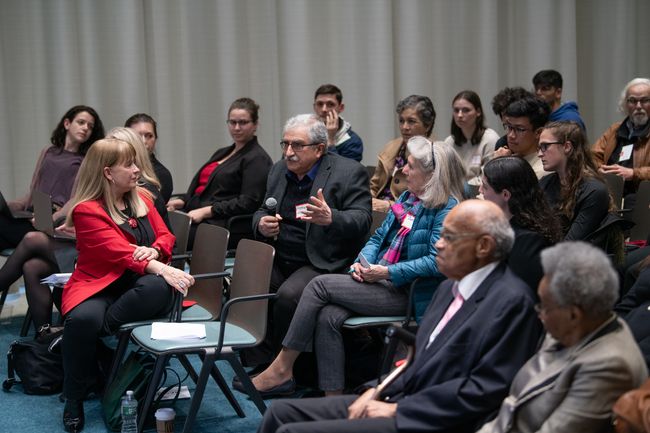 Lecture audience asking questions at the 2024 Hubie Jones Lecture in Urban Health