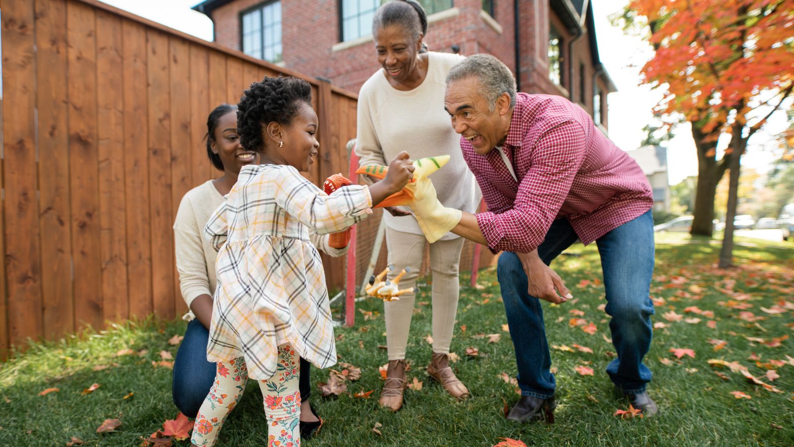Grandparents, parent and granddaughter together