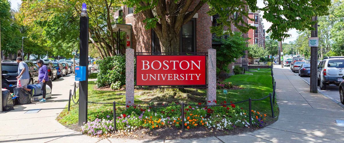 A Boston University sign posted outdoors