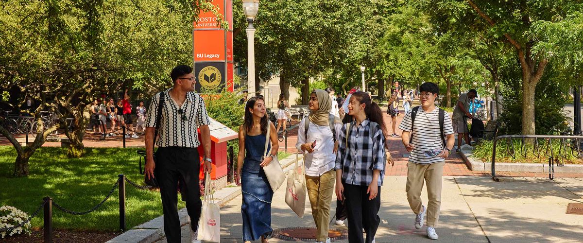 Students walking along BU's campus