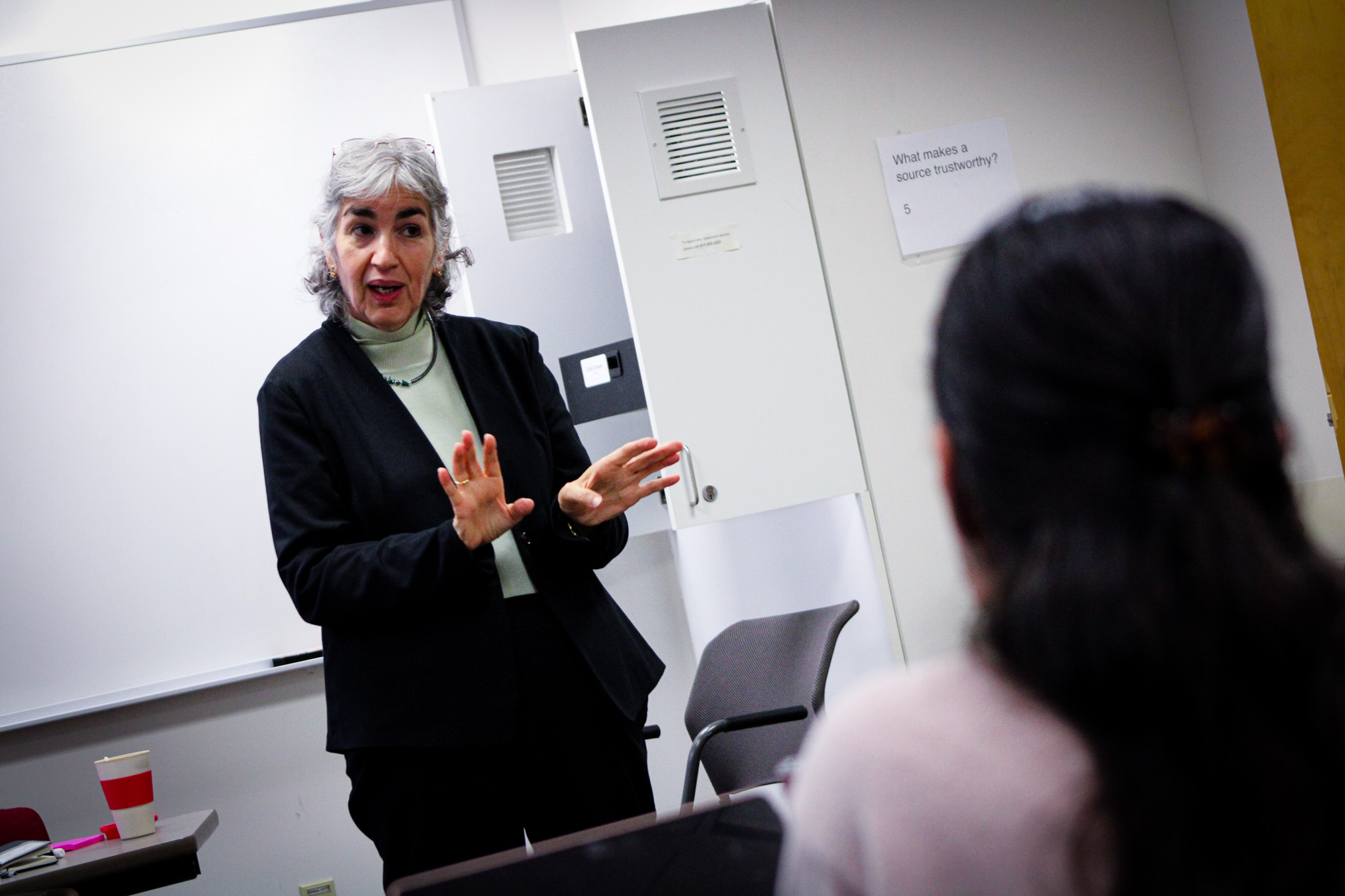 Eleonora Villegas-Reimers talking to some students