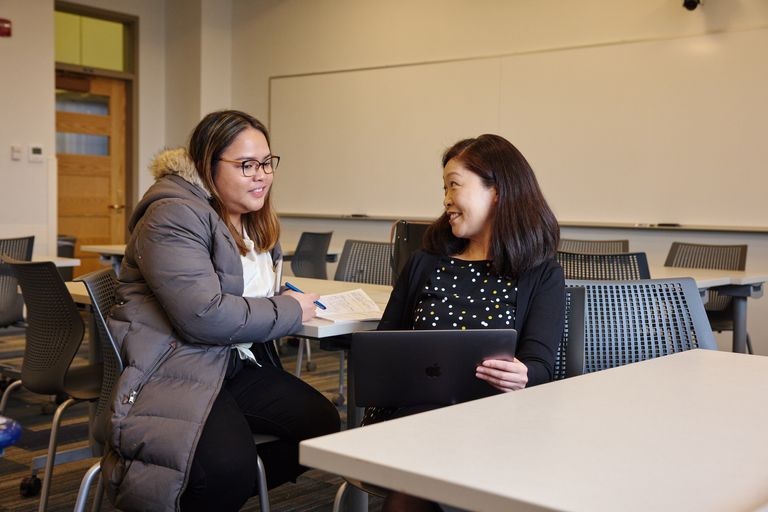 Nancy Harayama meeting with a student