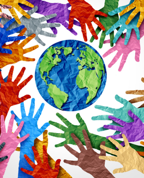 paper cut out of hands in all different colors all reaching for a paper version of the globe