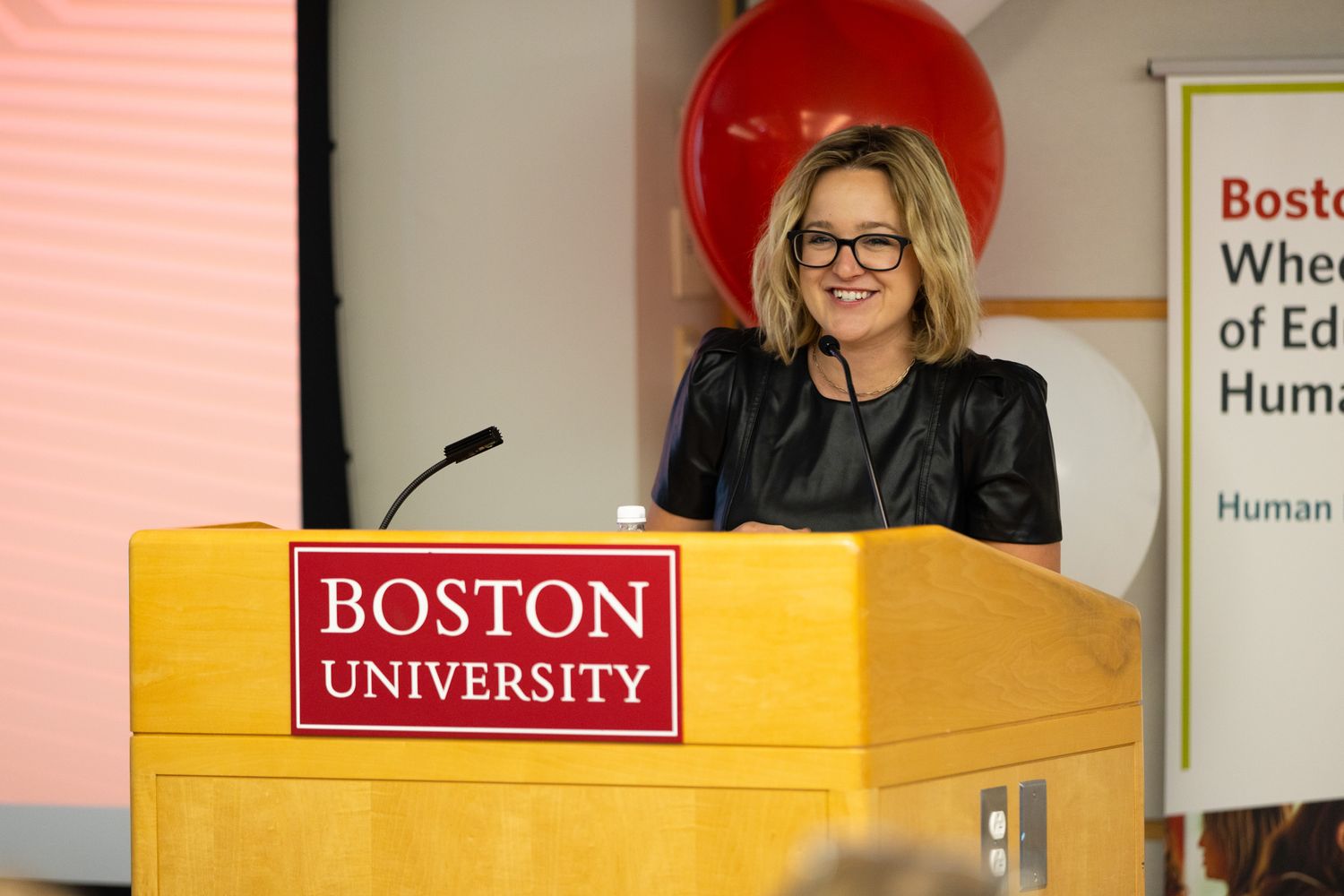 Alumni awards comitee chair Addie LaRoche ('19,'21) introducing the award recipients at the 2023 alumni awards