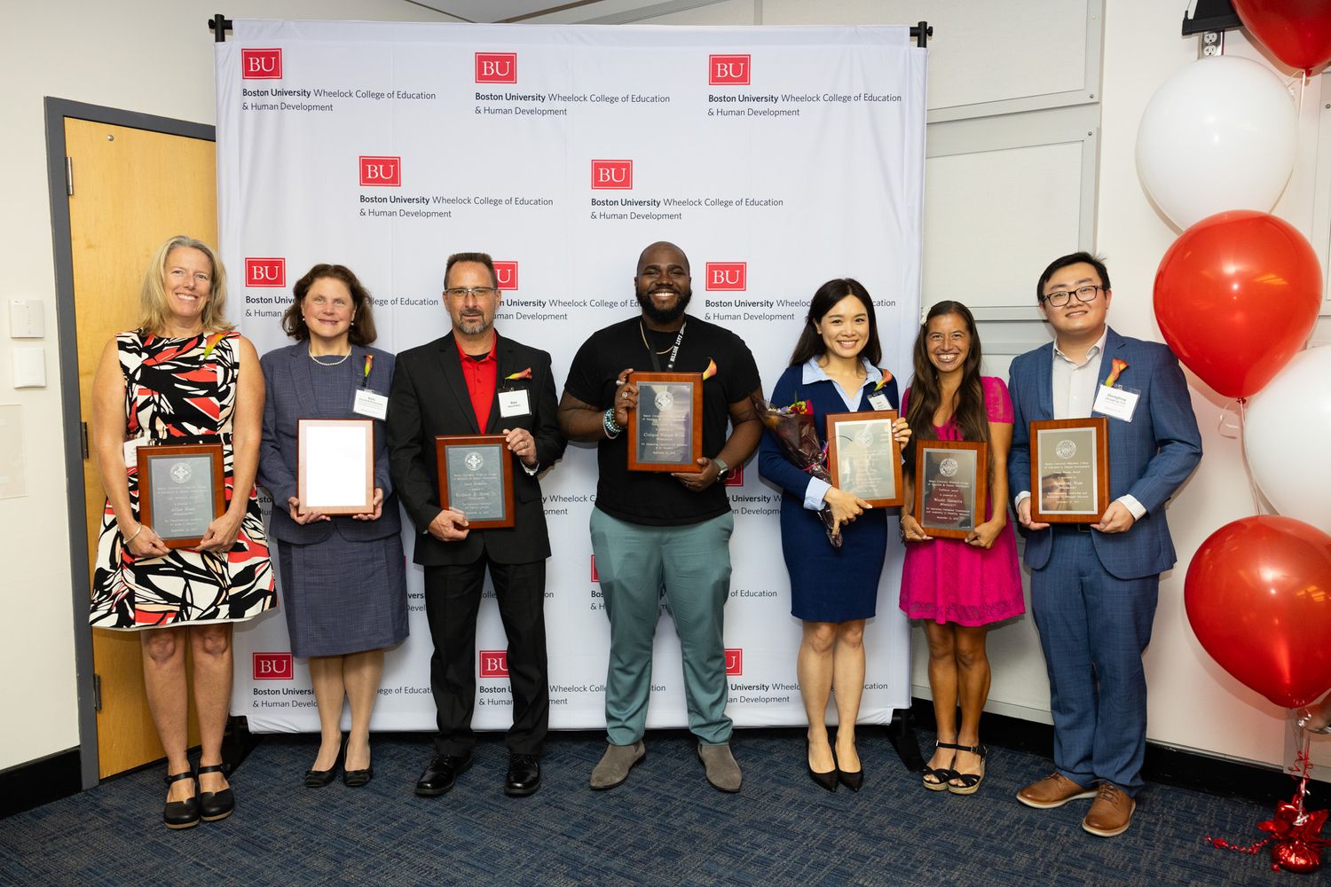 Alumni award recipients from left to right, Alice Shea ('95),Kyla McSweeney ('94'97), Russ Hoyt accepting on behalf of Rick Hoyt ('93), Cinique Weekes-Bynoe ('16), Karen Lo ('13), Nicole Homerin ('17), & Zhongfeng Tian ('16).