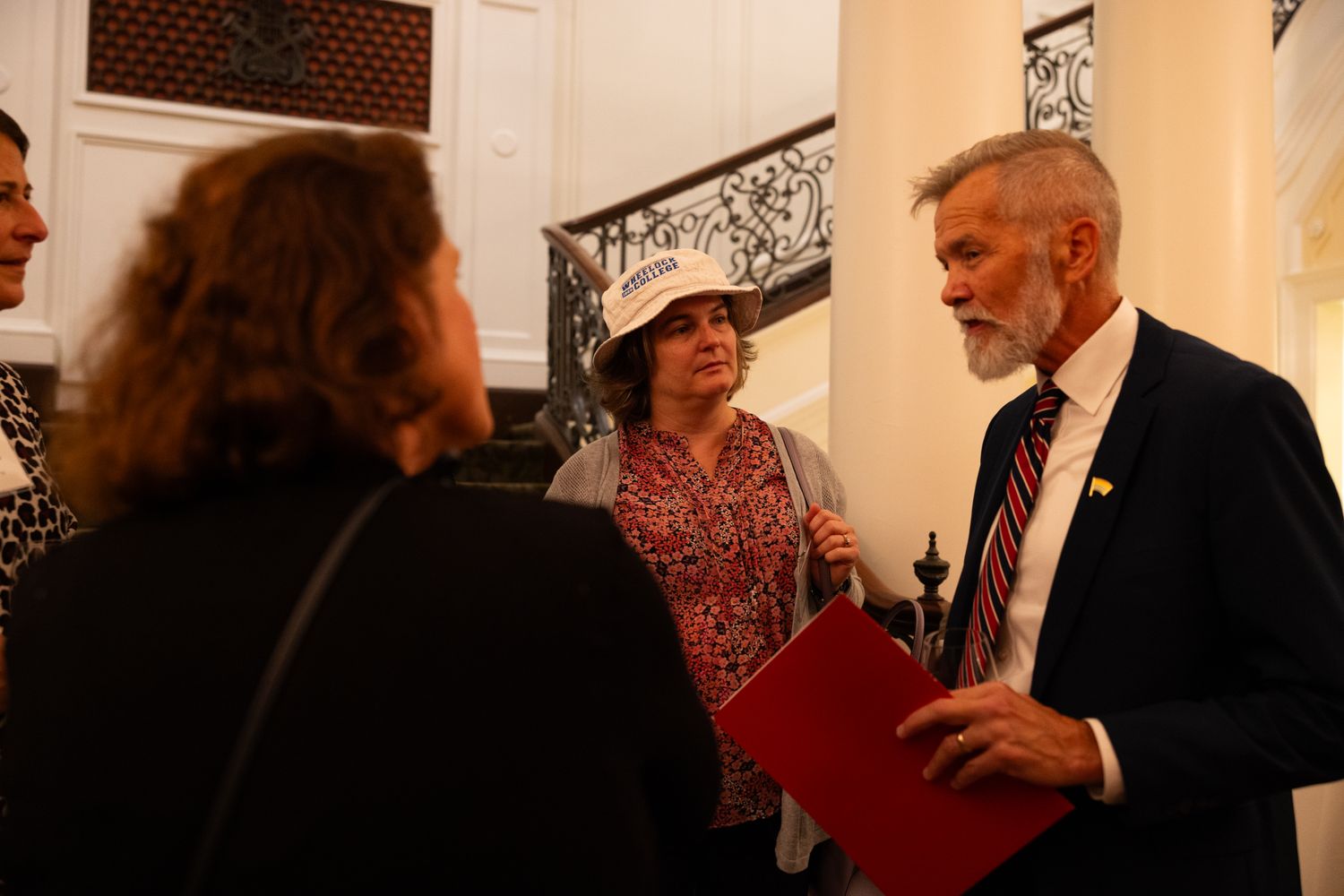 Dean David Chard speaking with alumni at the alumni dinner