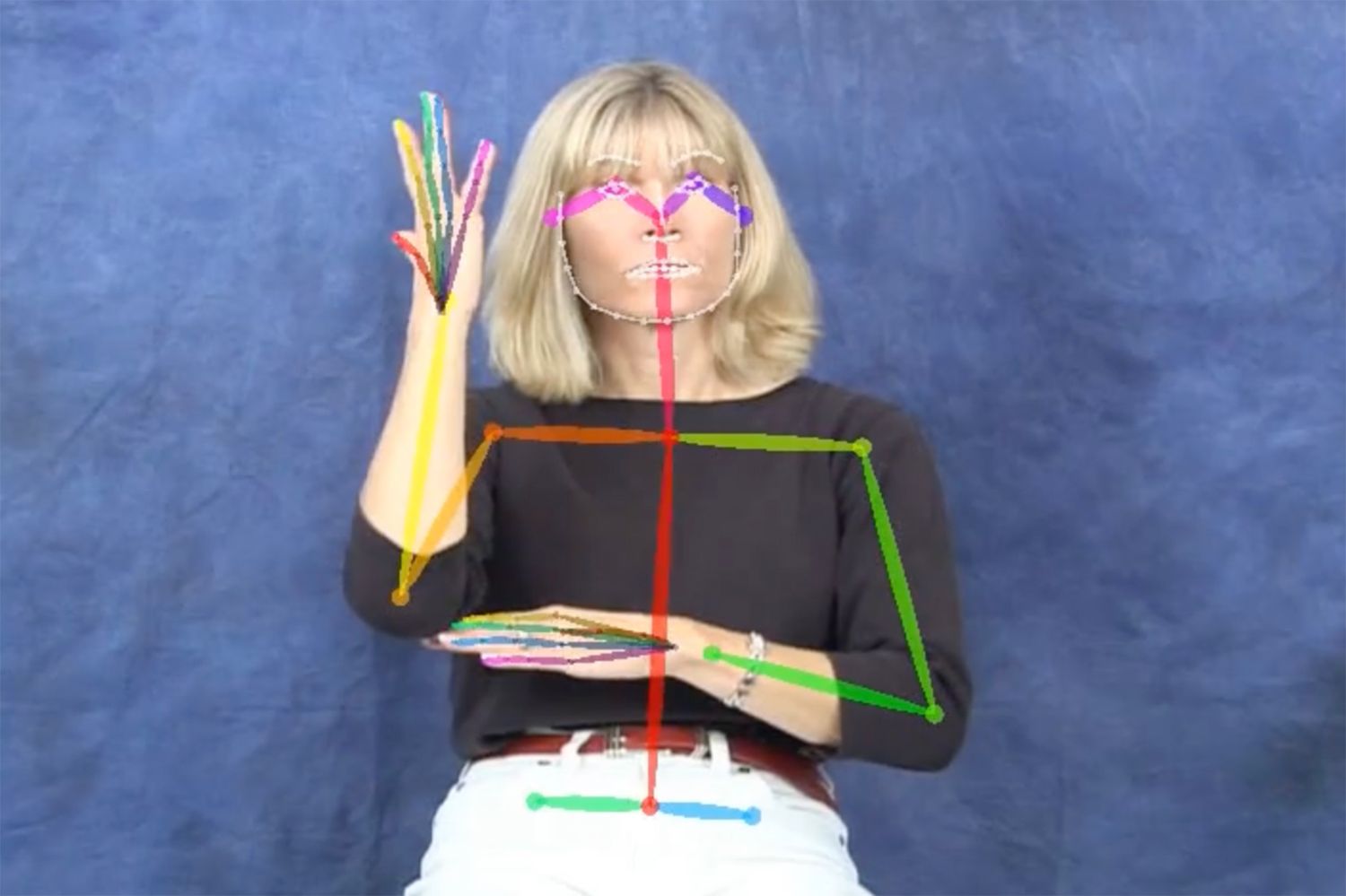 Blond women signing with AI tracking overlayed on top