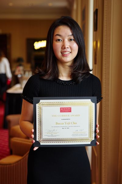 Shows Yeji Becca Cho holding an award