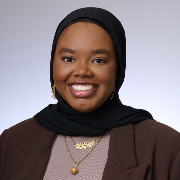 Shows head and shoulders of Nafisa Bilal